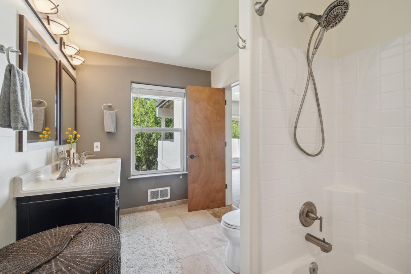 400 Dorrance Road Boulder Creek, CA 95006 - Photo 34 of 62 a bathroom with a granite countertop sink a toilet and shower