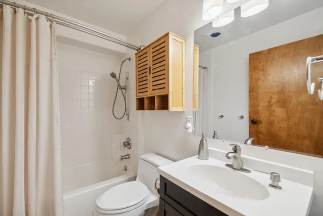 a room with furniture and a fireplace