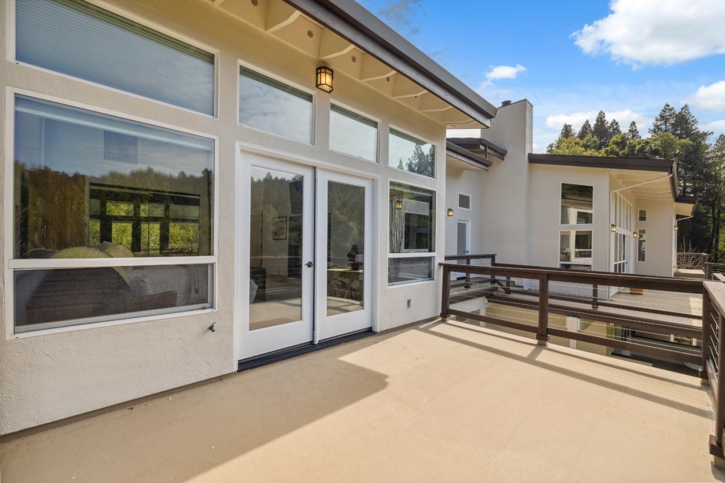 400 Dorrance Road Boulder Creek, CA 95006 - Photo 36 of 62 a view of a building with glass door