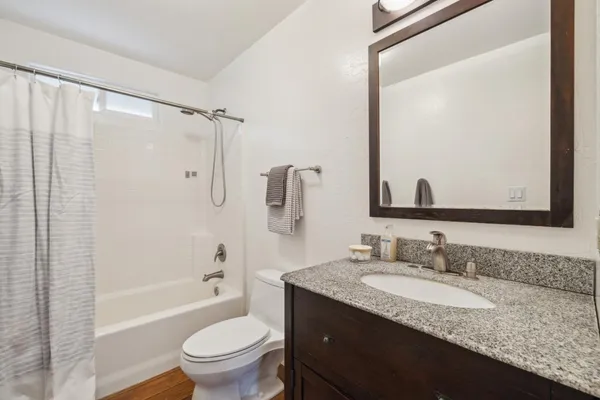 a picture of a bathroom with a sink