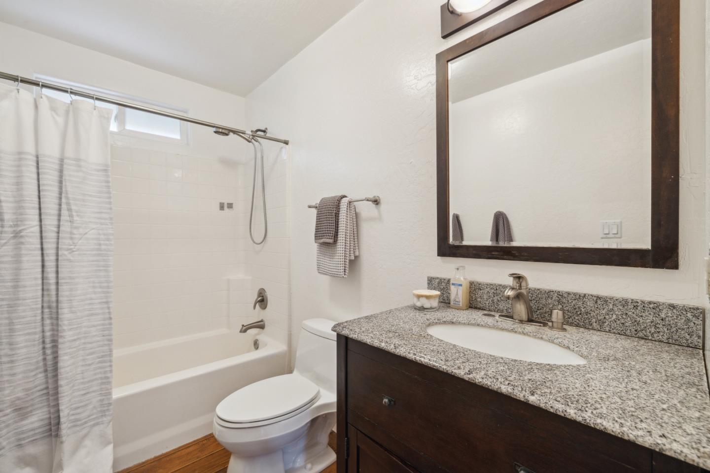 400 Dorrance Road Boulder Creek, CA 95006 - Photo 50 of 62 a bathroom with a granite countertop sink toilet and shower