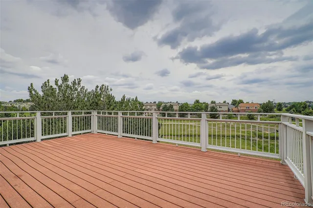 a view of a lake with wooden floor
