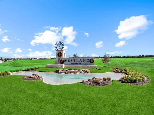 a view of a garden with lawn chairs