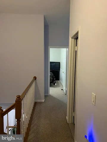 a view of a hallway with a small space