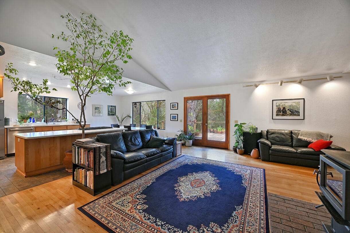 9355 Lower River Road Grants Pass, OR 97526 - Photo 2 of 41 a living room with furniture and a large window