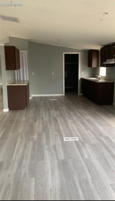 9260 County Road East Olney Springs, CO 81062 - Photo 3 of 11 a view of kitchen and microwave