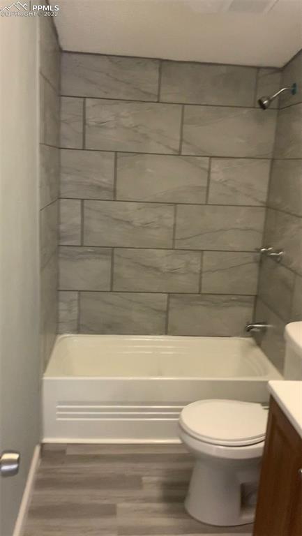 9260 County Road East Olney Springs, CO 81062 - Photo 6 of 11 a bathroom with a toilet and a bathtub