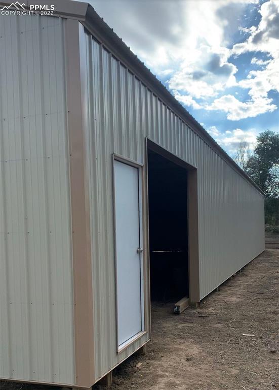 9260 County Road East Olney Springs, CO 81062 - Photo 8 of 11 a view of a wooden door