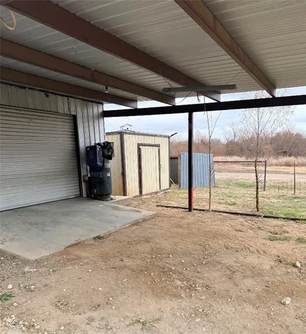 a view of house with a yard