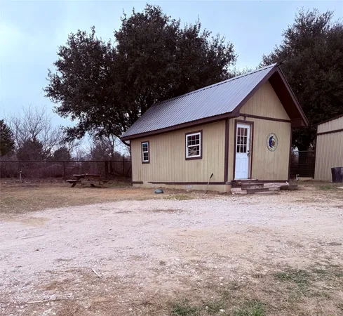 a view of house with a outdoor space