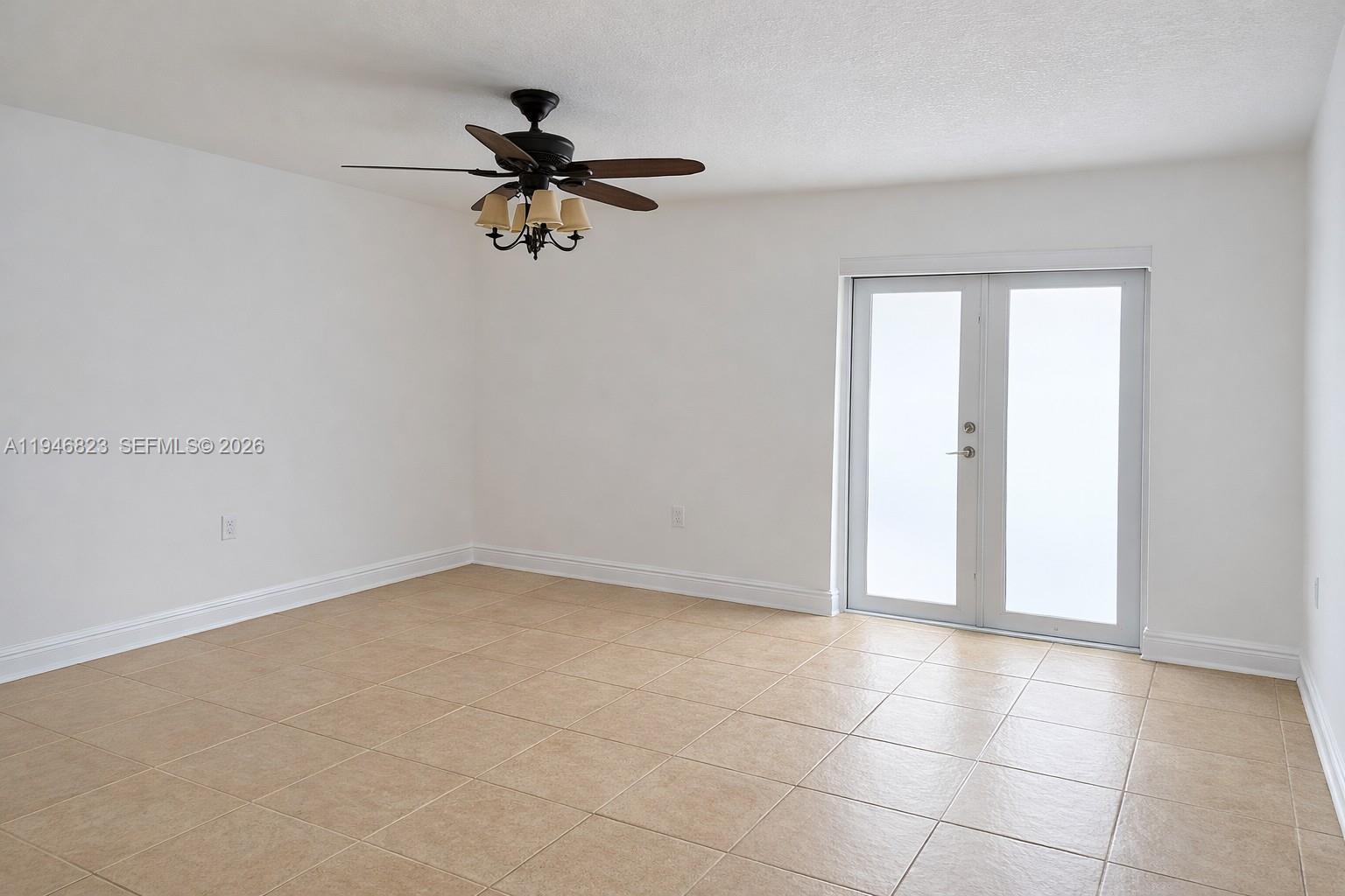 10923 West Okeechobee Road, Unit 201 Hialeah Gardens, FL 33018 - Photo 5 of 13 wooden floor in an empty room