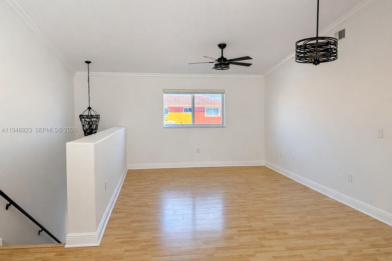 10923 West Okeechobee Road, Unit 201 Hialeah Gardens, FL 33018 - Photo 10 of 13 a view of a room with a sink and a window