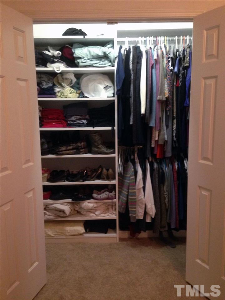 705 Glen Road, Unit 112 Garner, NC 27529 - Photo 8 of 12 walk-in closet with built-in shelves