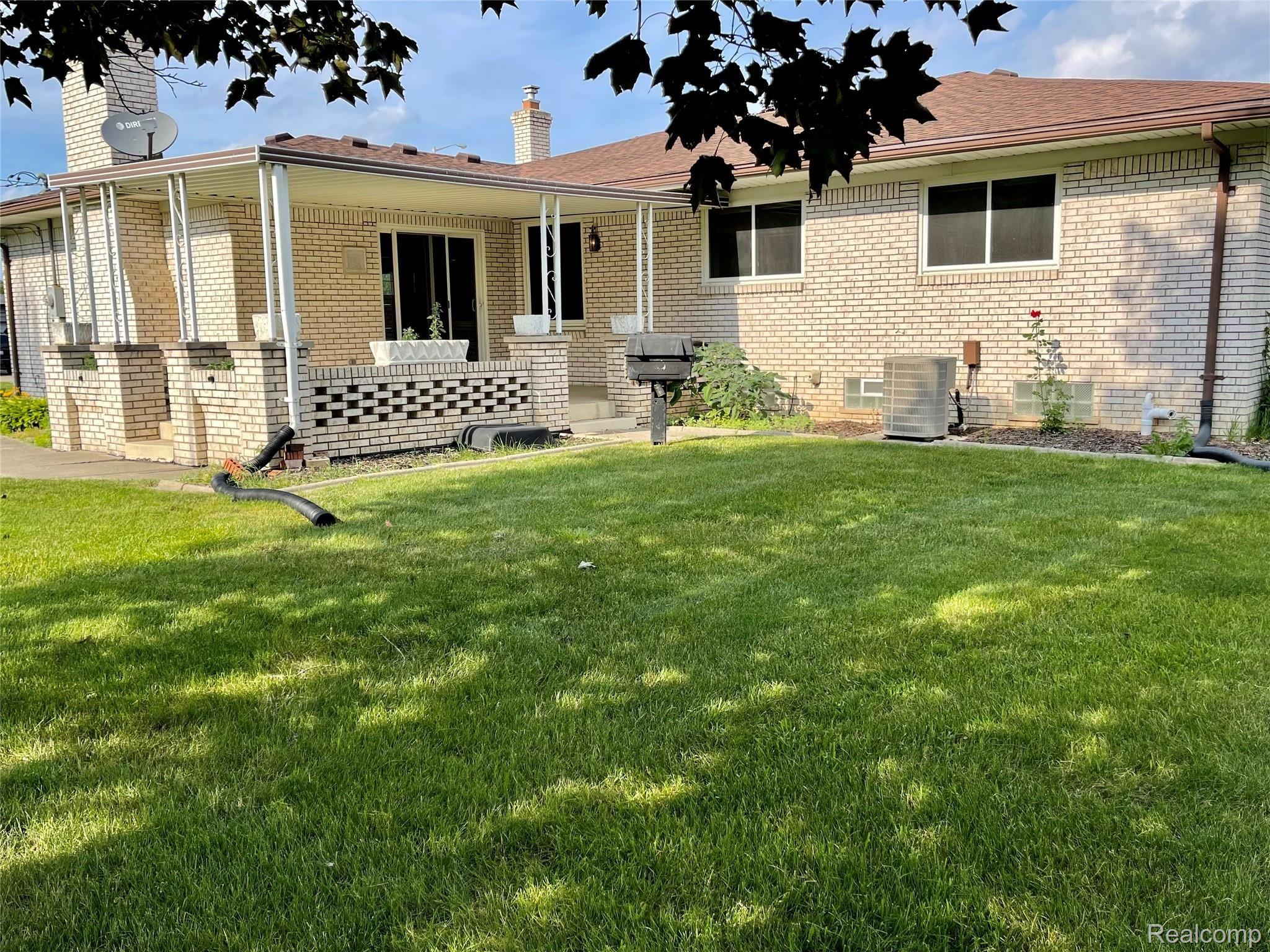 37481 Ryan Road Sterling Heights, MI 48310 - Photo 12 of 47 covered patio III.jpg