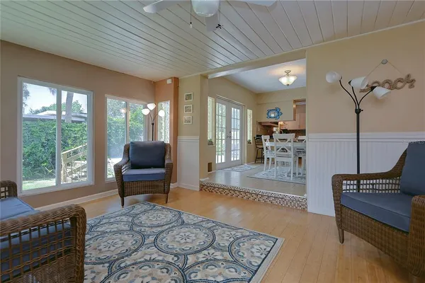 a view of cabinets and wooden floor