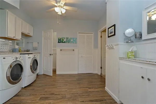 a view of kitchen with wooden floor