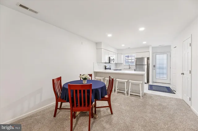 a view of a dining room with furniture