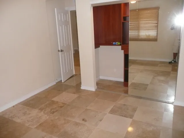 a bathroom with a shower and toilet