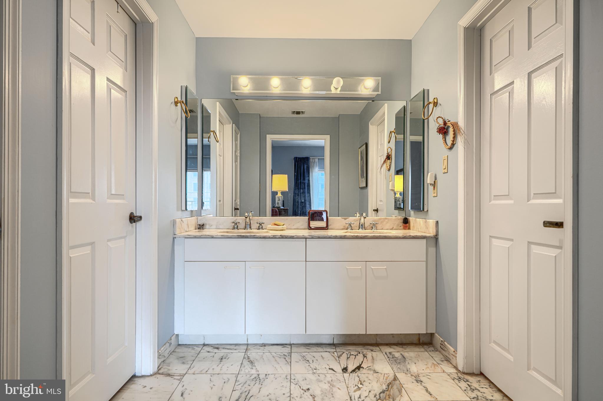 3801 Canterbury Road, Unit 912 Baltimore, MD 21218 - Photo 55 of 79 Primary bathroom with double vanity