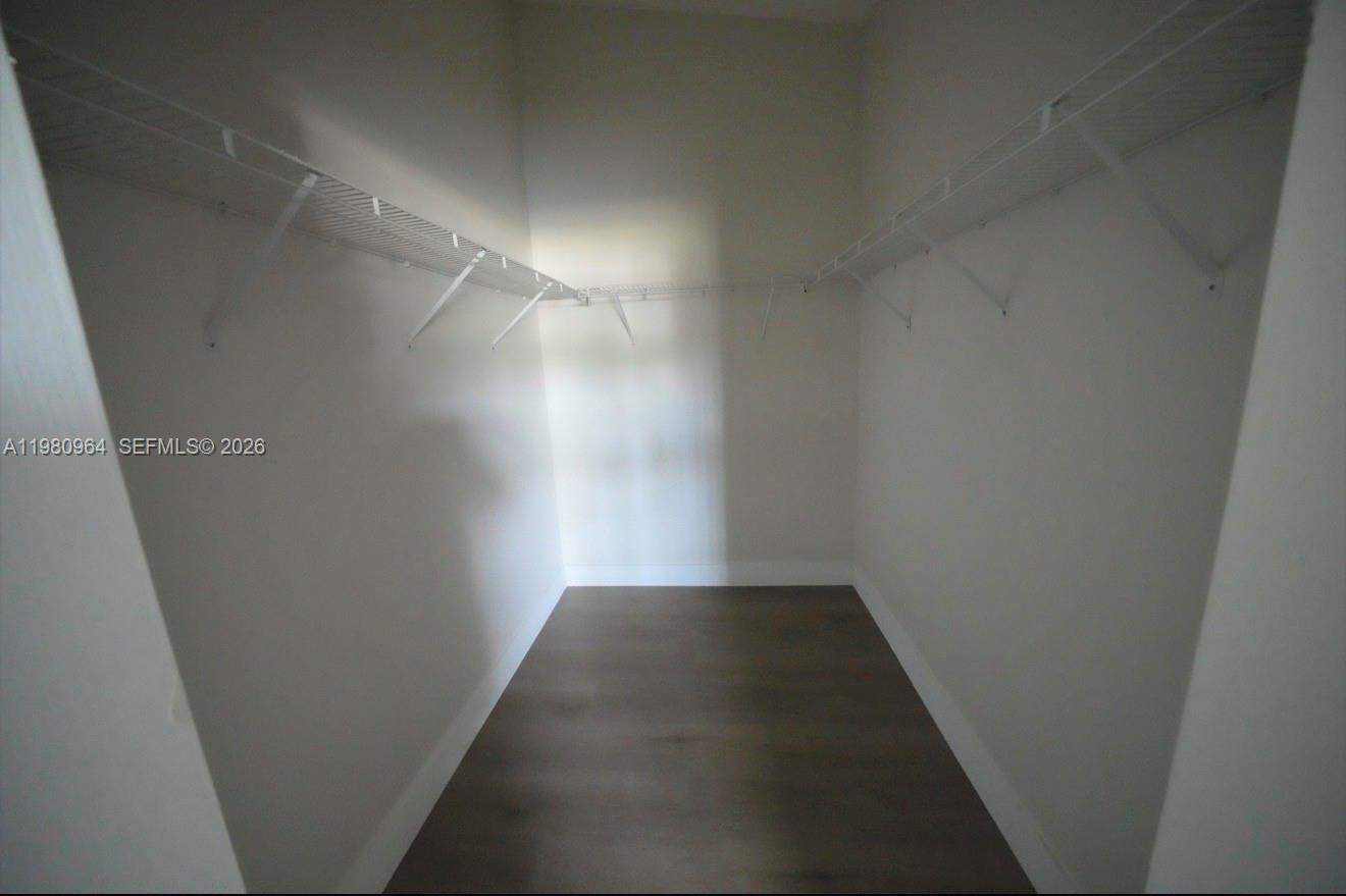 9921 Southwest 164th Court Miami, FL 33196 - Photo 12 of 20 a view of a hallway