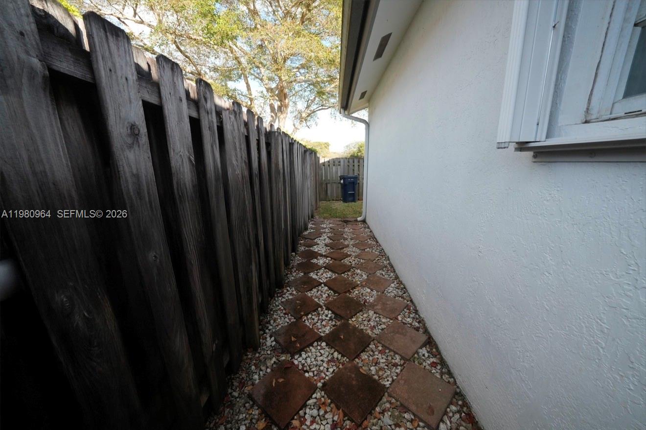 9921 Southwest 164th Court Miami, FL 33196 - Photo 18 of 20 a view of balcony with wooden floor