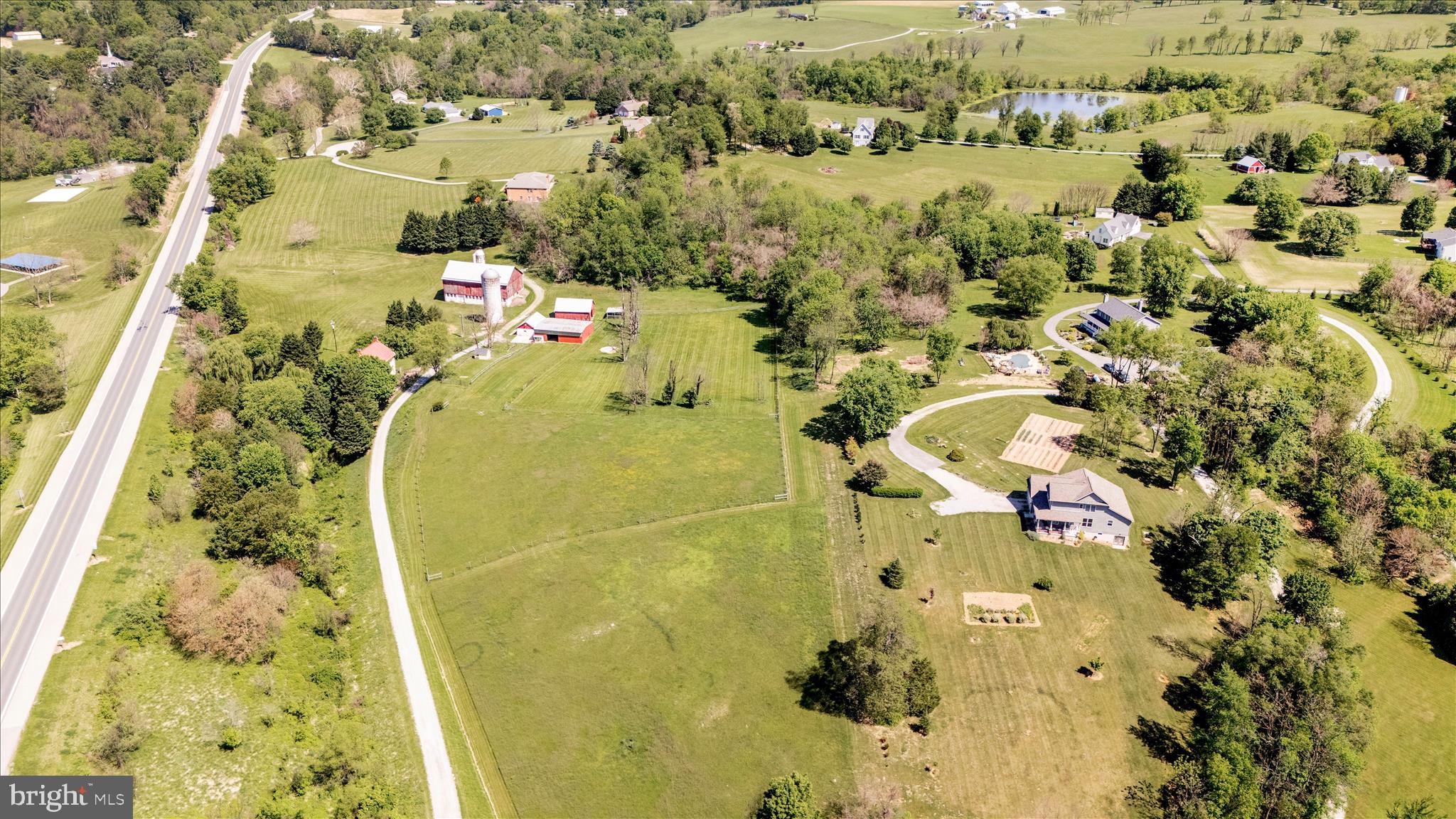20508 Gapland Road Rohrersville, MD 21779 - Photo 2 of 4 an aerial view of residential house with swimming pool and large trees