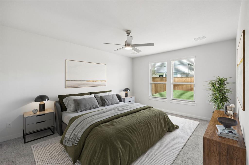 1460 Companero Street Haslet, TX 76052 - Photo 14 of 35 a bedroom with a large bed and a window