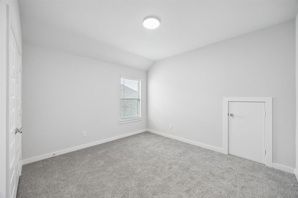 1460 Companero Street Haslet, TX 76052 - Photo 24 of 35 a view of an empty room with a window