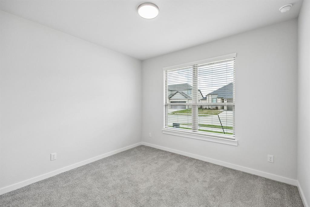 1460 Companero Street Haslet, TX 76052 - Photo 25 of 35 an empty room with windows
