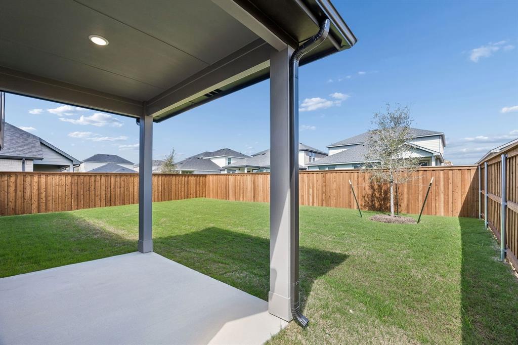 1460 Companero Street Haslet, TX 76052 - Photo 32 of 35 a view of a backyard