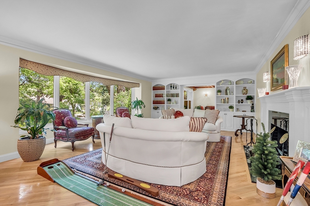 595 Salisbury Street Worcester, MA 01609 - Photo 3 of 41 a living room with furniture potted plant and a large window