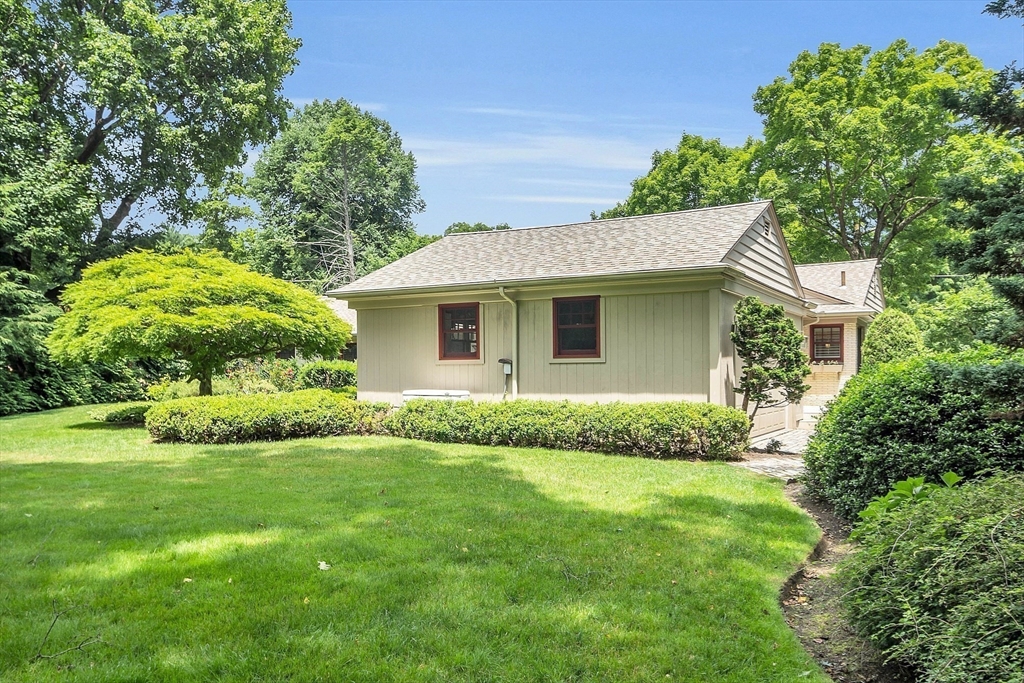 595 Salisbury Street Worcester, MA 01609 - Photo 35 of 41 a view of a house with a yard and potted plants