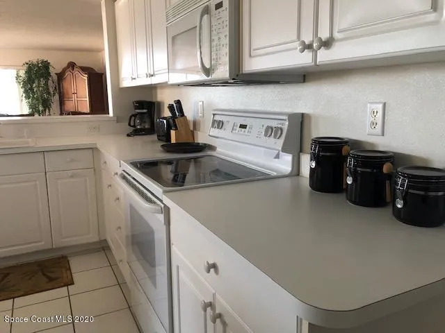 a bed room with a bed and a dresser