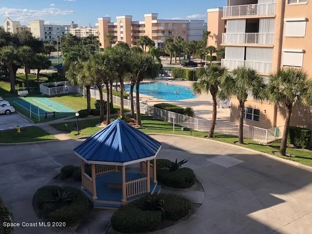 front view of a house with a potted plant