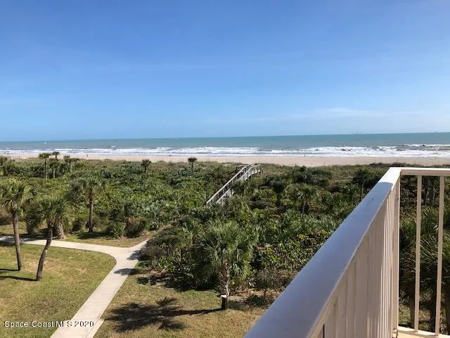 a view of a balcony with an outdoor space