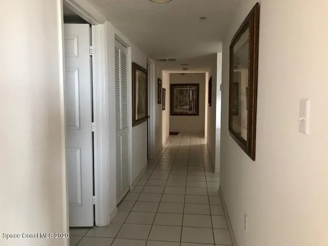 a living room with furniture rug and window