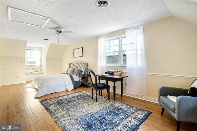 a view of a city with mountains in the background