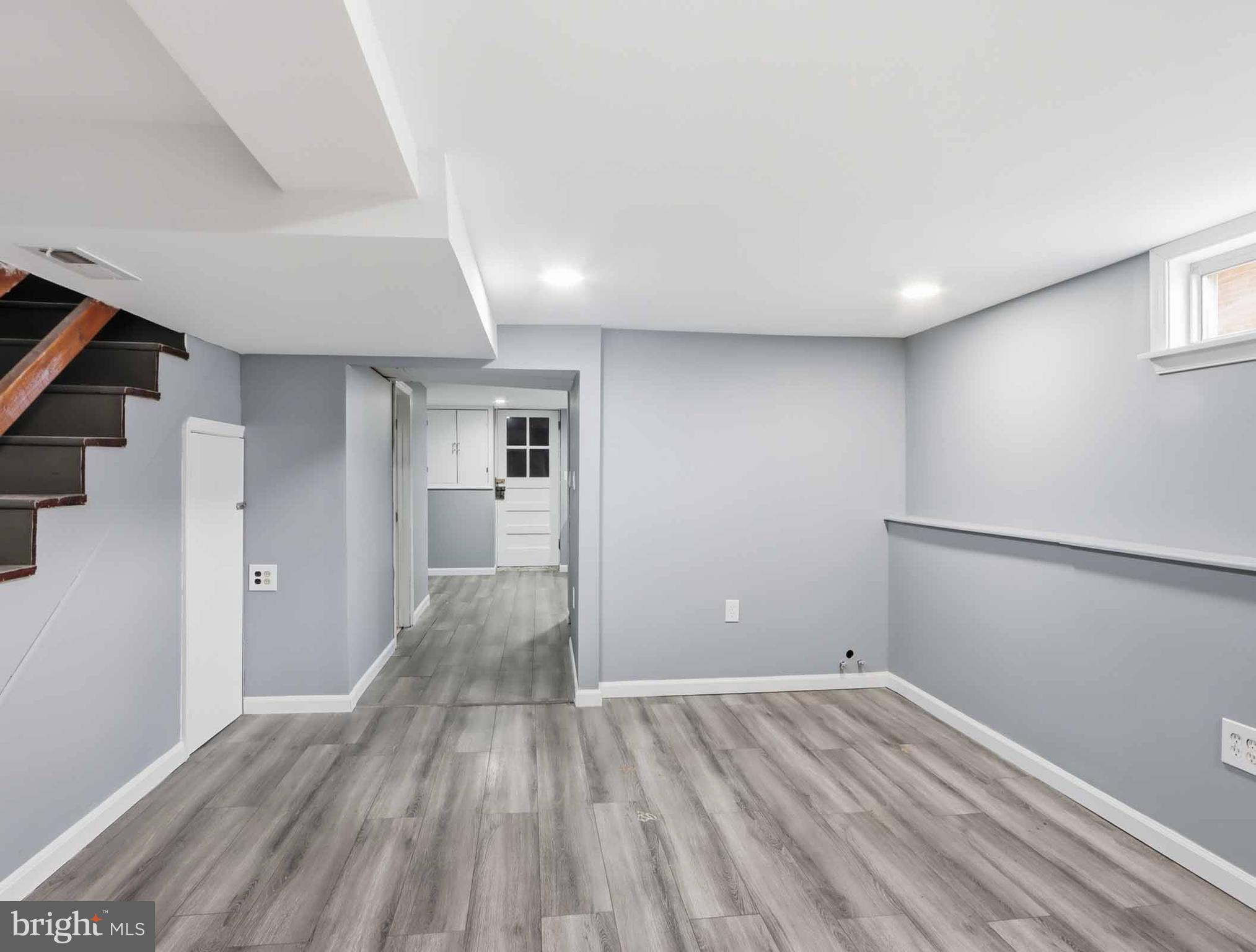 6832 Broening Road Baltimore, MD 21222 - Photo 17 of 34 a view of empty room with wooden floor