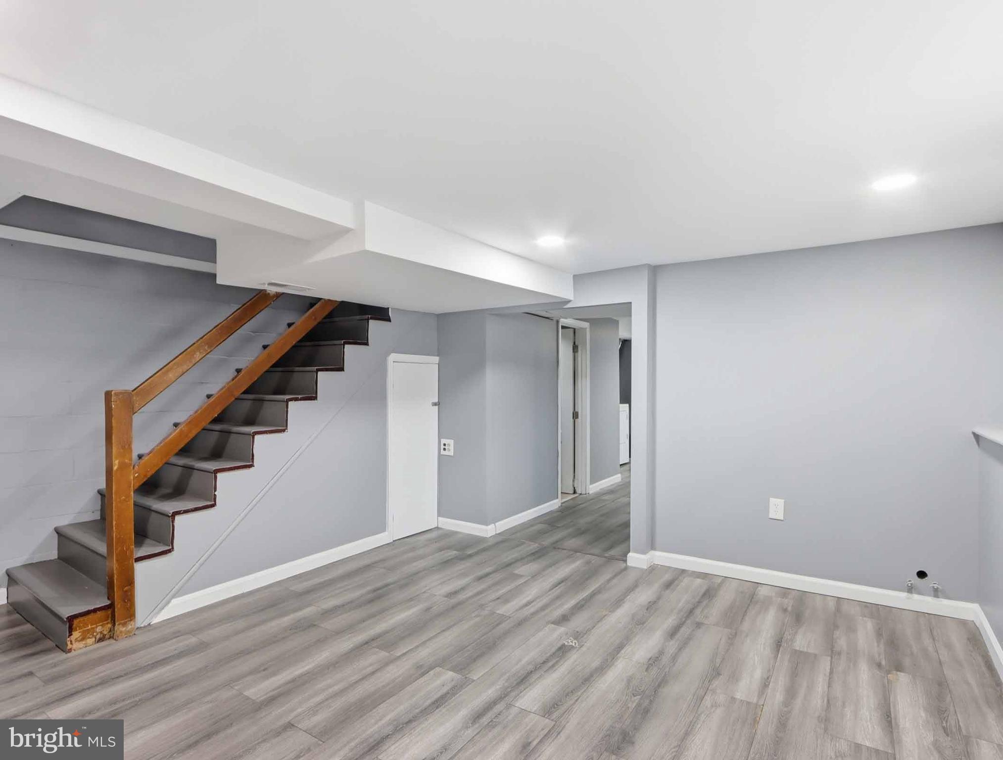 6832 Broening Road Baltimore, MD 21222 - Photo 18 of 34 a view of an empty room with stairs and ventilation