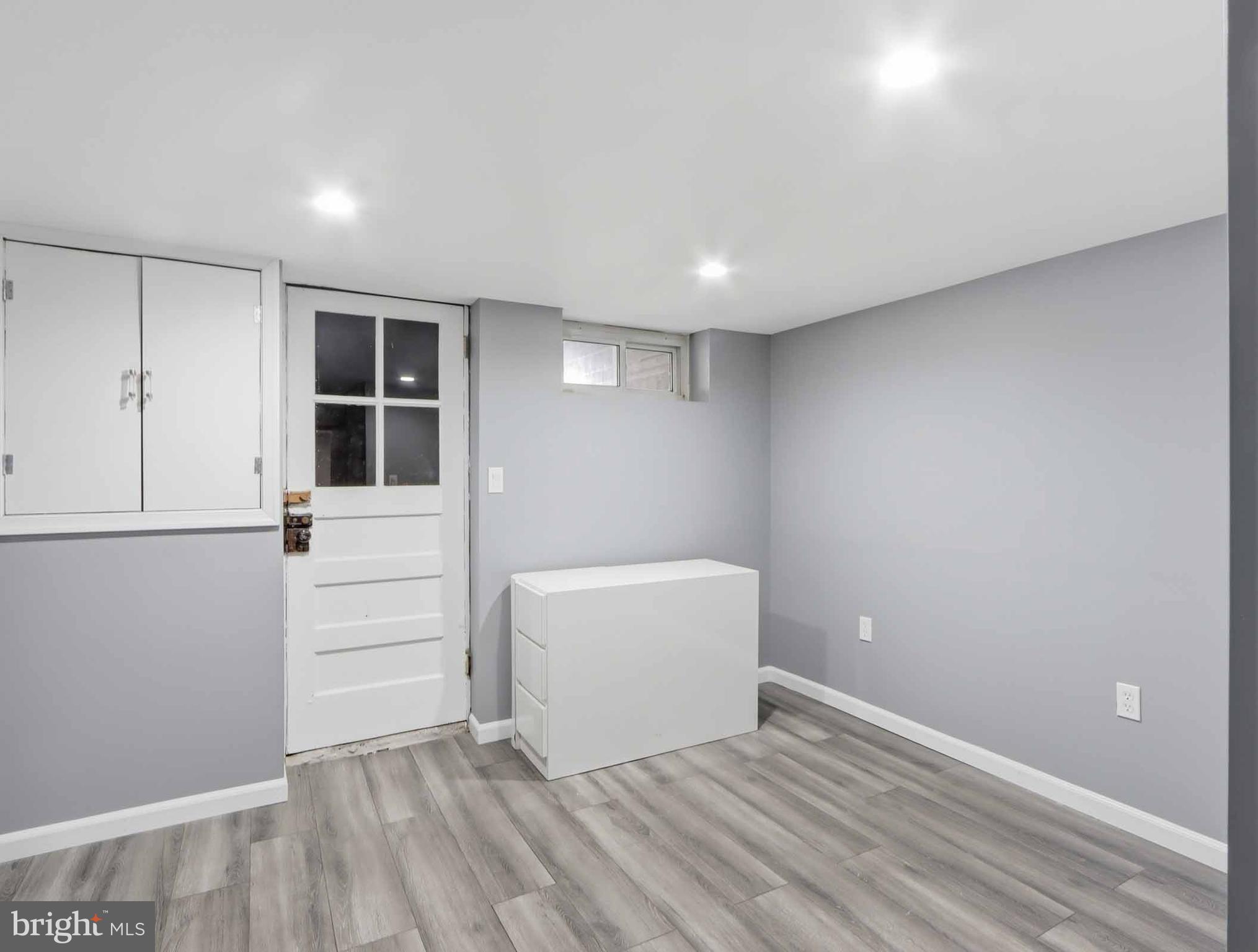 6832 Broening Road Baltimore, MD 21222 - Photo 22 of 34 a view of an empty room with a window