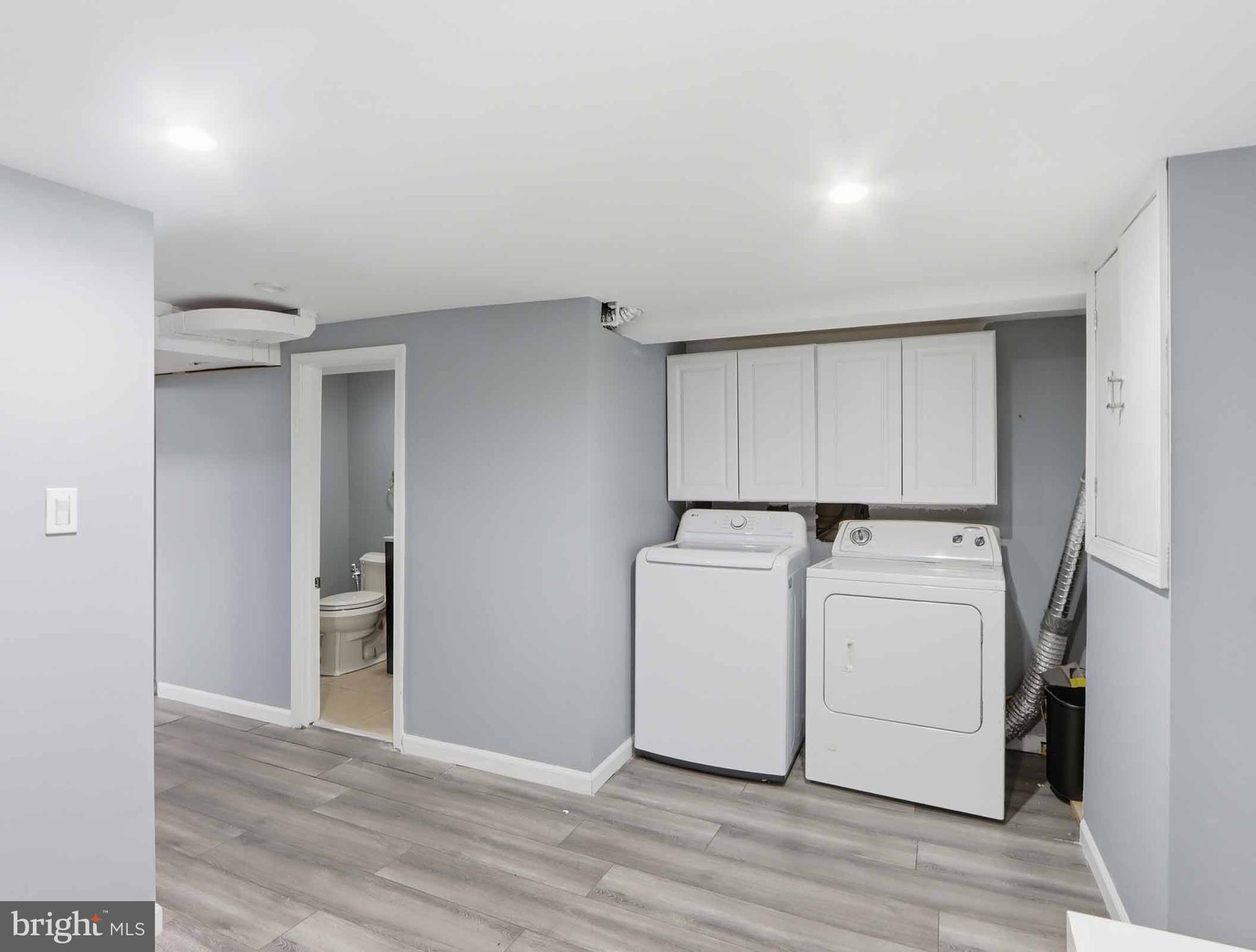 6832 Broening Road Baltimore, MD 21222 - Photo 24 of 34 a view of a storage & utility room with washer and dryer
