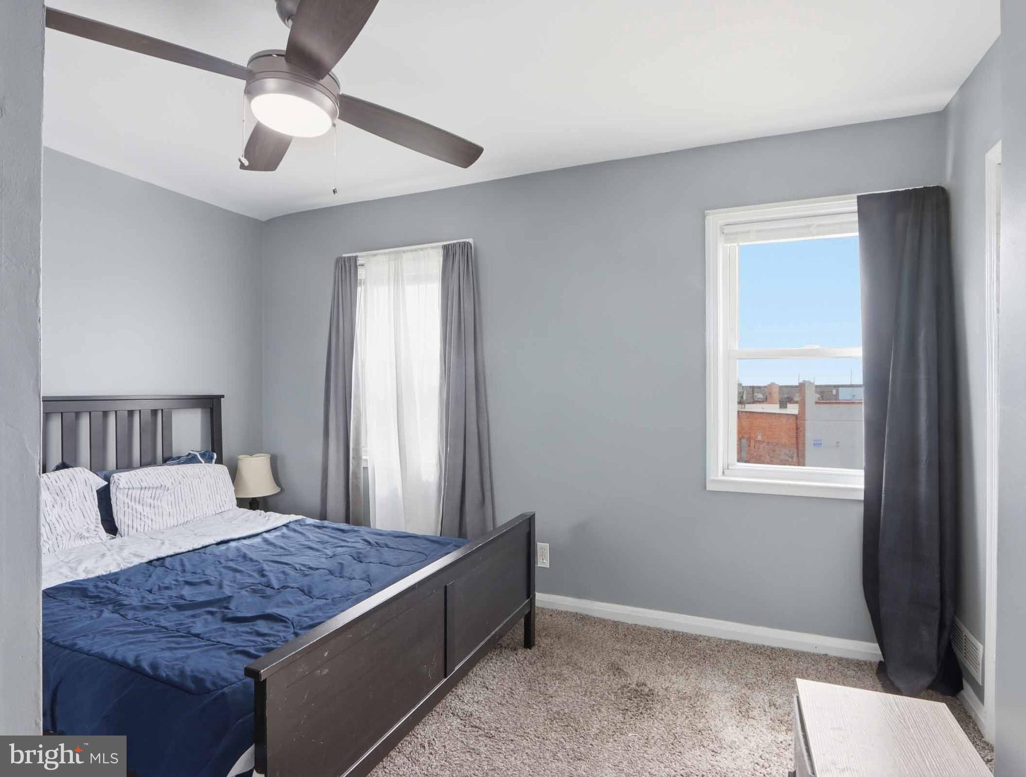 6832 Broening Road Baltimore, MD 21222 - Photo 31 of 34 a living room with furniture and a window