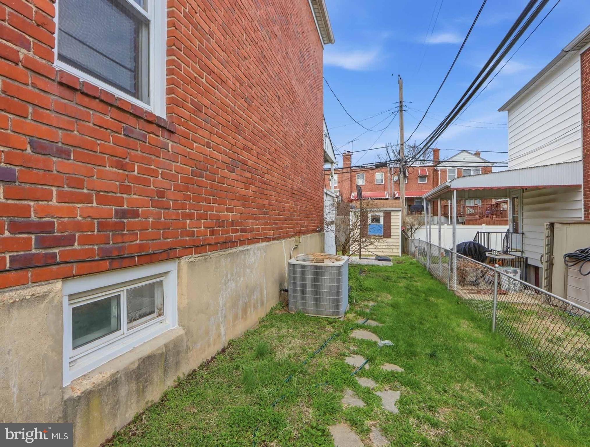 6832 Broening Road Baltimore, MD 21222 - Photo 34 of 34 a view of a backyard with a patio