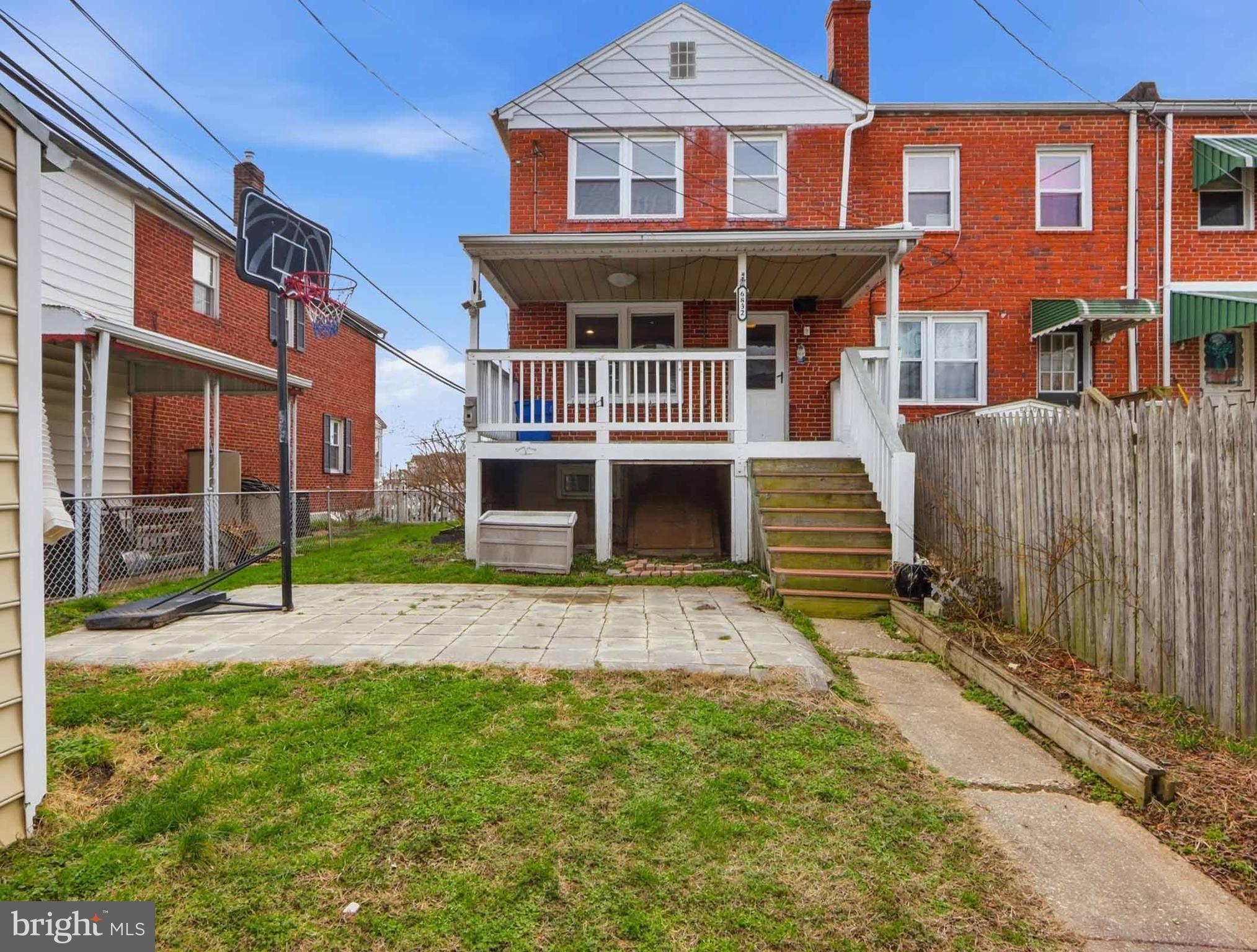 6832 Broening Road Baltimore, MD 21222 - Photo 4 of 34 front view of house with a yard