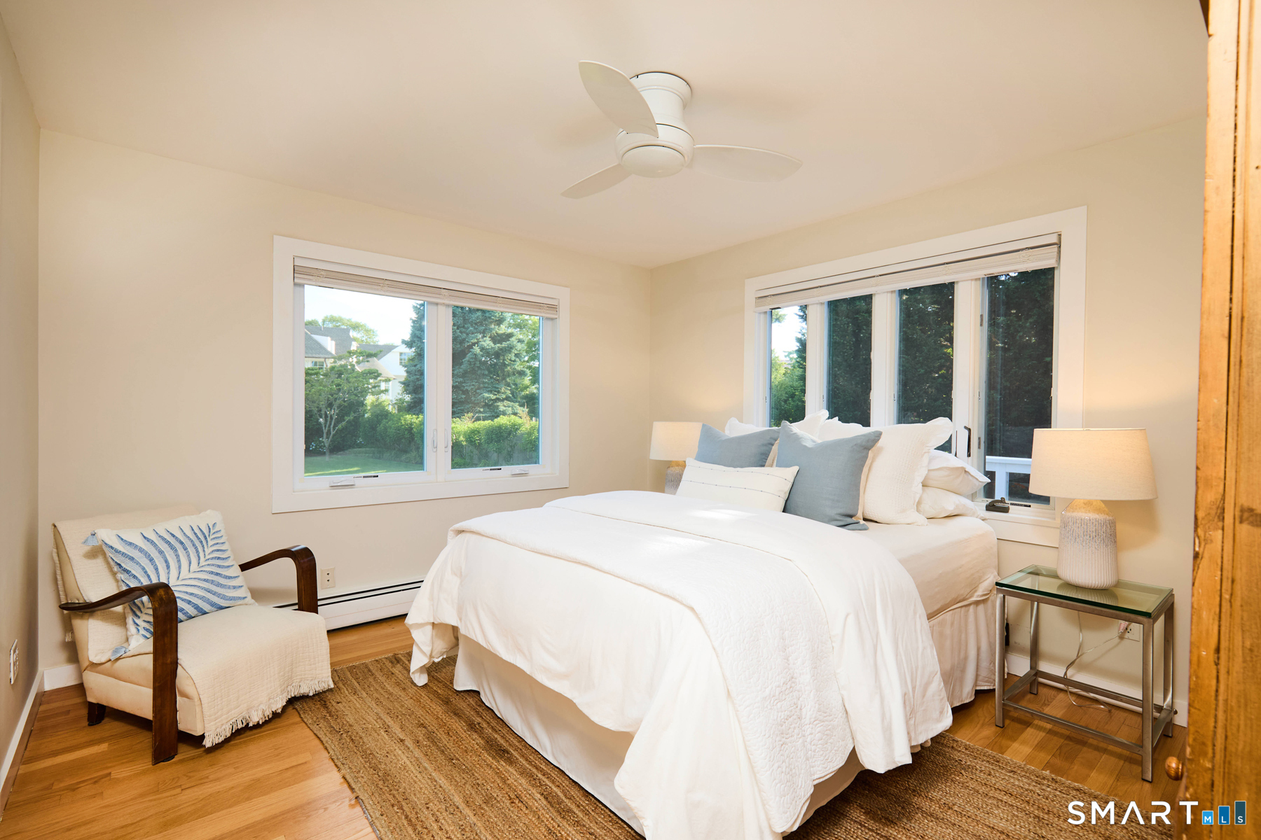 16 Harbor Road Westport, CT 06880 - Photo 23 of 36 a bedroom with a bed and a couch
