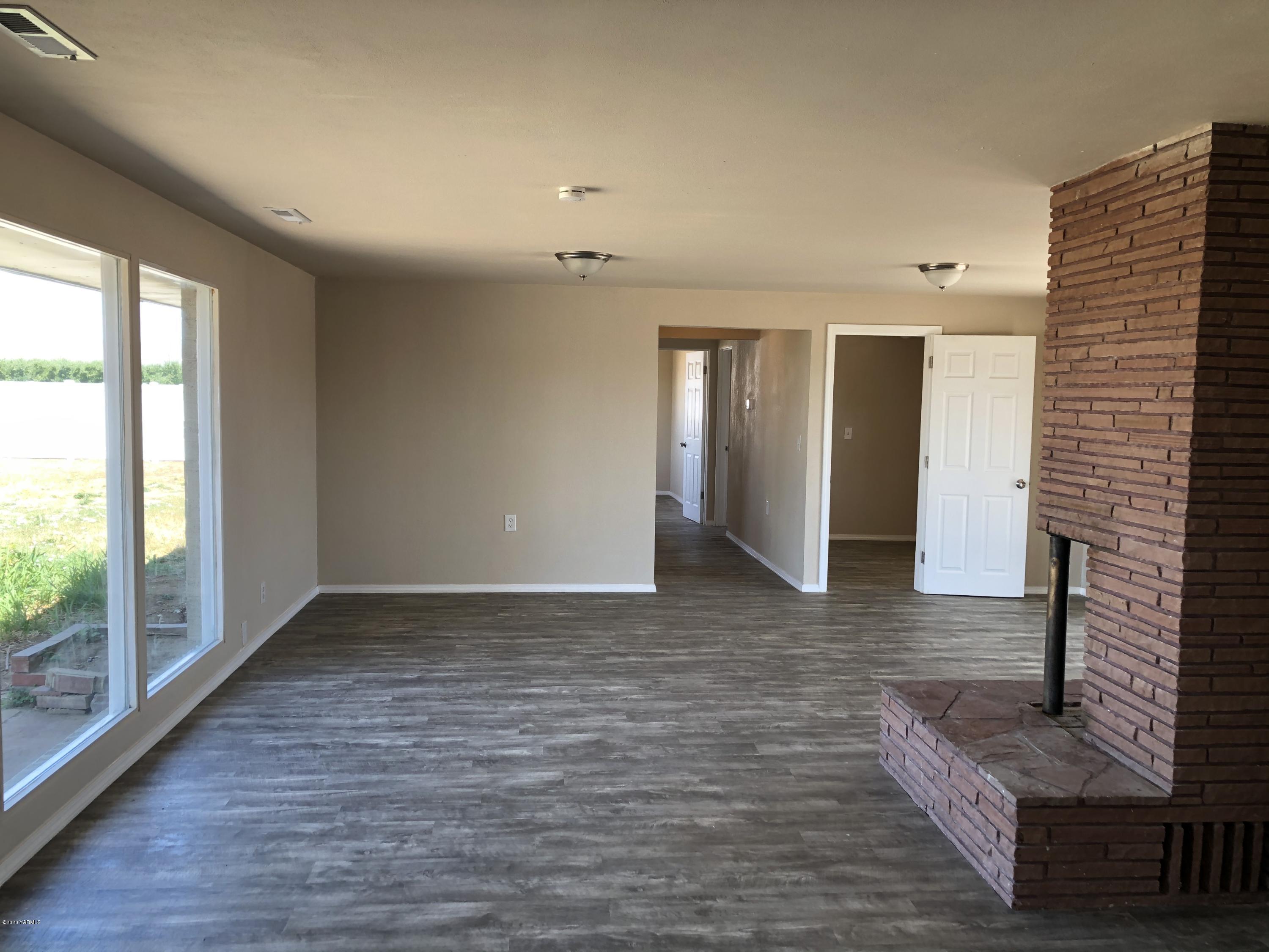 4950 Lateral A Road Wapato, WA 98951 - Photo 17 of 31 a view of livingroom with furniture and wooden floor