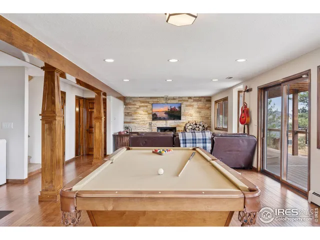 a room with furniture and a large window