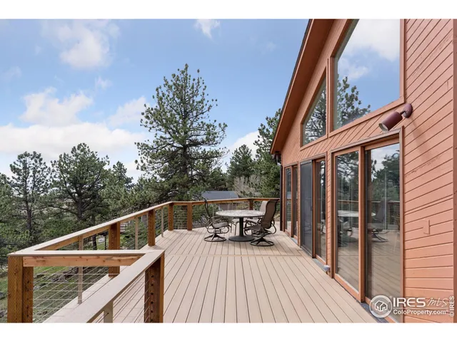a view of balcony with furniture
