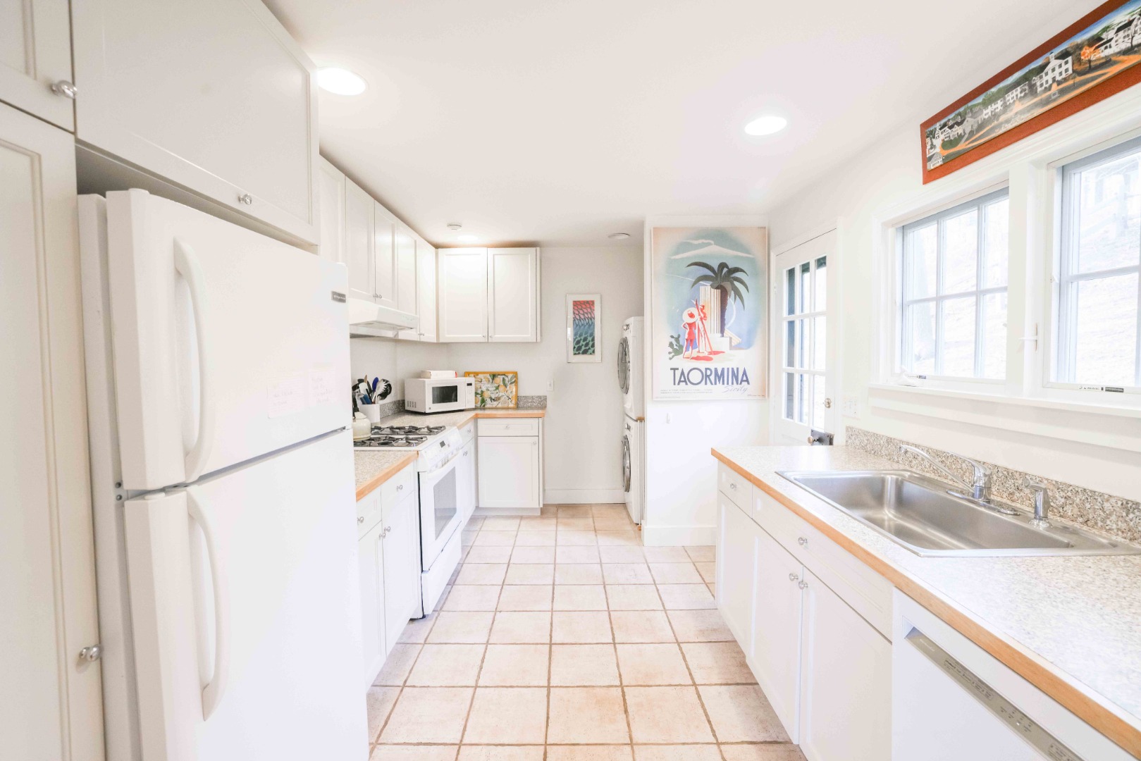 13 West Chester Street Nantucket, MA 02554 - Photo 13 of 32 a kitchen with a refrigerator a sink and a stove top oven