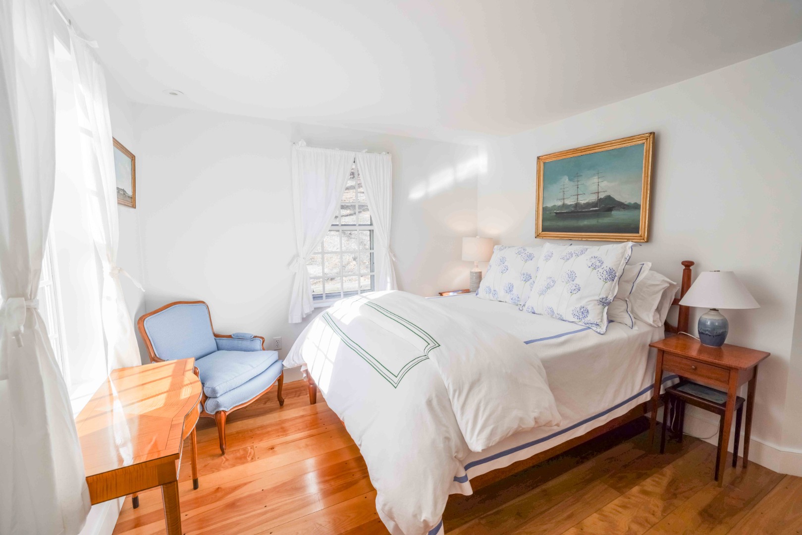 13 West Chester Street Nantucket, MA 02554 - Photo 19 of 32 a bedroom with a bed chair and window